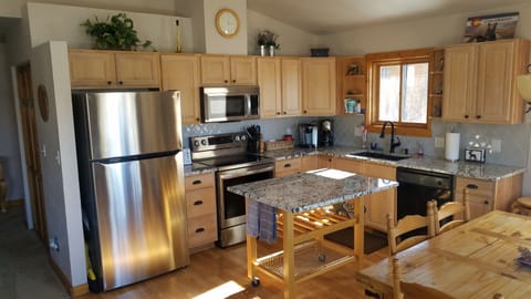 New stainless appliances & granite counters provide endless cooking capability