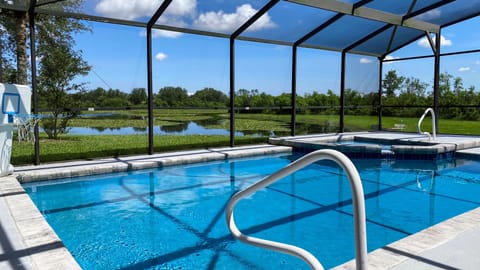Pool overlooking lake and conservation area