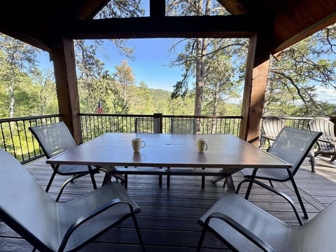 Covered and uncovered deck with gas grill