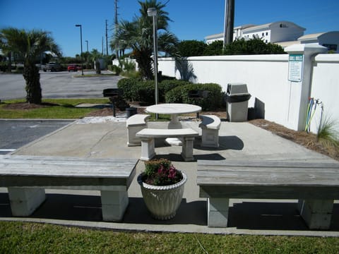 Grilling area with charcoal grills located at the back of our parking lot.