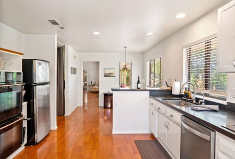 Oven, fridge, and dishwasher at The Source Home, 1000 Kiler Canyon Road for a home-like stay.