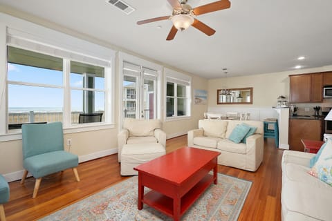 Open floor plan with fantastic ocean views from living, dining & kitchen