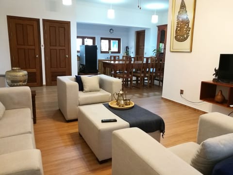 Private living, dinning table and kitchen