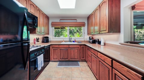 Fully equipped gourmet kitchen comes will all you'll need and more.