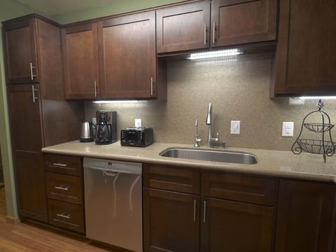 Kitchen w/granite tops, coffee and tea pots, toaster, blender and LED lights