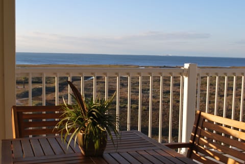 Breakfast is served on the balcony of this beautiful bayfront condominium.
