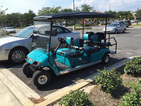 The new golf cart, teal to match the condo.  Driven to Starbucks, of course.  