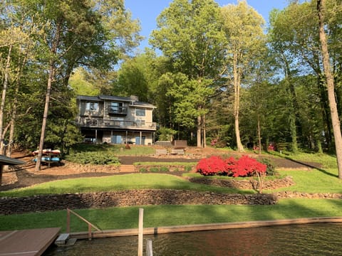 View of the house and yard from a cruise in the pontoon...new paint colors!