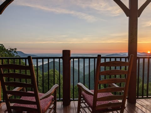 - Unwind on the porch with rocking chairs overlooking endless mountain peaks   - Watch the sun dip below the Smokies in breathtaking colors   - Peaceful balcony moments perfect for coffee or sunset reflections