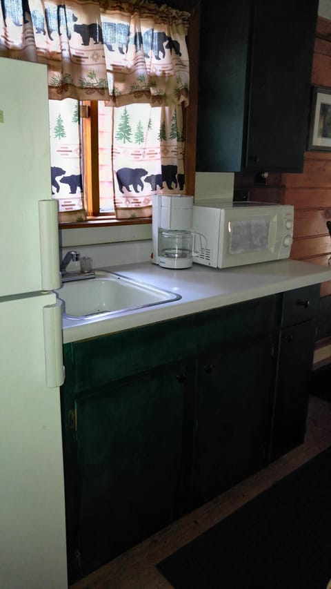 Bunkhouse kitchenette w/full refrigerator, microwave, coffee pot and  sink