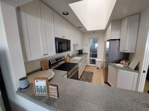 Spacious kitchen with ample prep space.