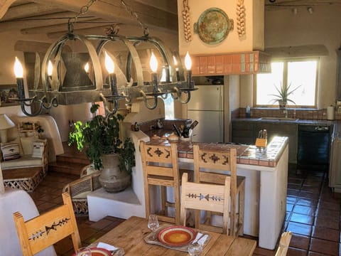 Dining Area with Breakfast Bar open to Kitchen and Great Room