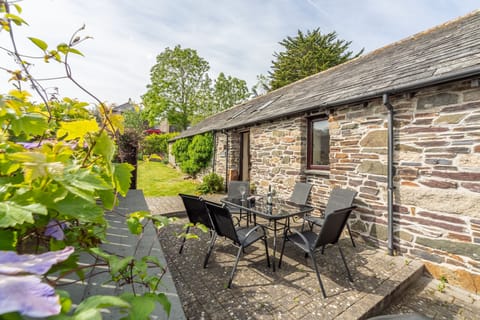 Little Gull, Roserrow. South-facing patio and lawned area with garden furniture