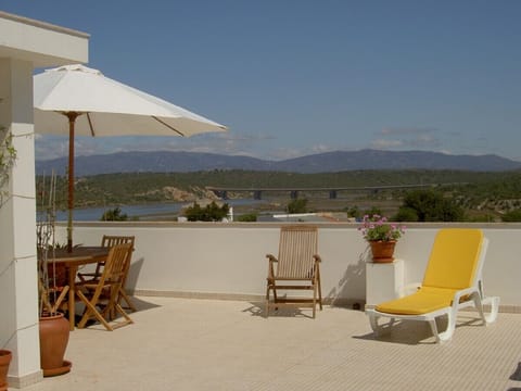 Private rooftop terrace with mountain and river views