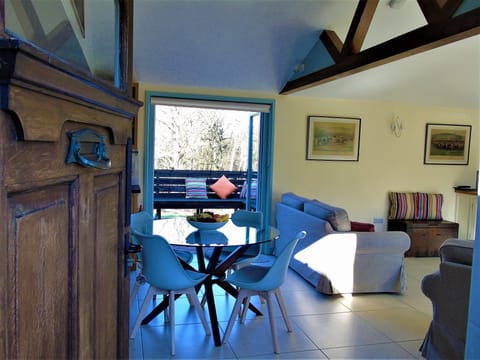 View of Flying Horse Cottage living room looking out to Decking platform