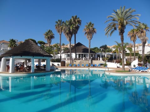 The magnificent palm fringed pool with Tucano's restaurant in the background