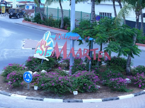 Attractive welcoming sign to the entrance of Maho Village.