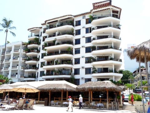 Exterior from beach - unit is 2nd balcony from top - 2nd in from left