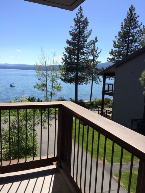 View from deck! Table and four chairs and BBQ