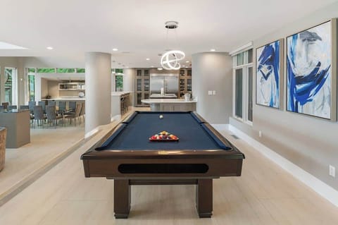 Challenge your friends to a game of billiards in this stylish and inviting space, perfect for friendly competition and relaxation