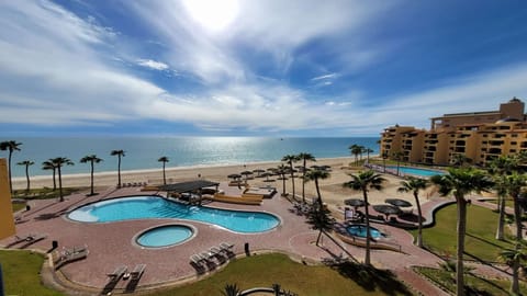 Two-story penthouse views stretching across Sandy Beach and the Sea of Cortez.