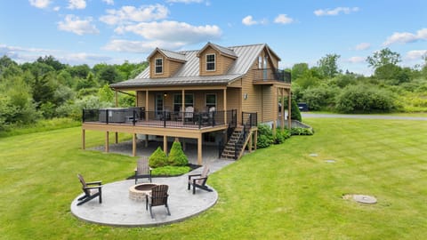 View of the cabin, yard area and firepit