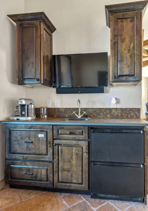 Custom bar with refrigerator- freezer, dishwasher and Nespresso machine