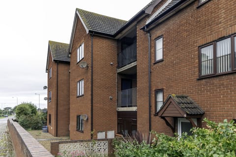 Outside view of apartment to the front overlooking the road ( top floor)