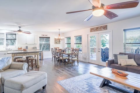 Main level open floor plan with kitchen, living room, dining room