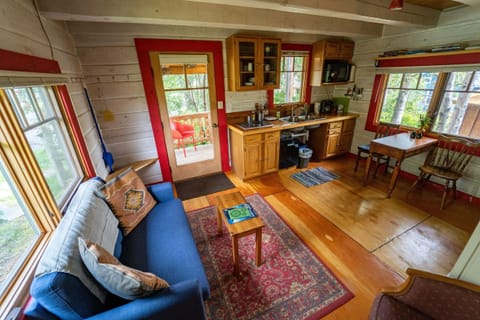 Kitchen has mini-fridge, stove , kettle, coffee maker, microwave, etc.