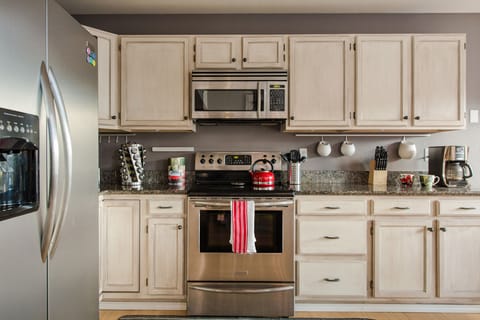 Open concept, upgraded kitchen.