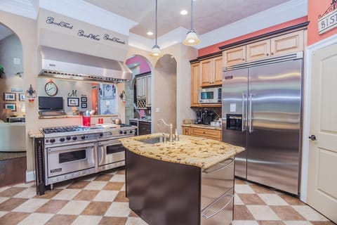 6 burner Viking stove w/double ovens. Viking fridge & under-counter fridge.