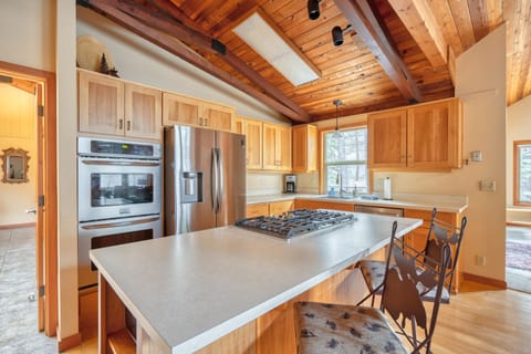 Fully stocked chefs kitchen with double wall oven