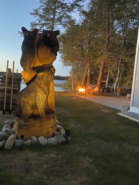 Sleeping bear sculpture with firepit

