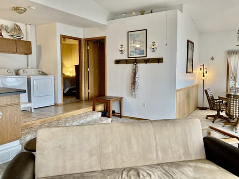 Open floor plan. Bedrooms beyond the doors.