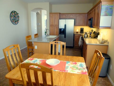 Kitchen table for 4 with flexibility of extra capacity up to 6 by adding leaf.