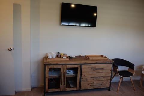 DVD player behind TV.
Tea and coffee making facilities.
