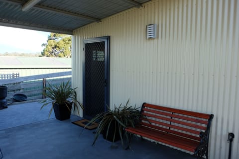 Outdoor undercover  BBQ and seating is yours to use.