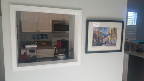 Handy coffee bar with access from inside or outside the kitchen.