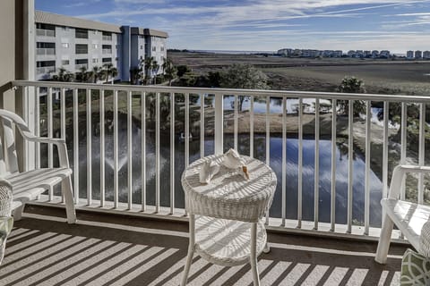 Balcony view of ocean and marsh
