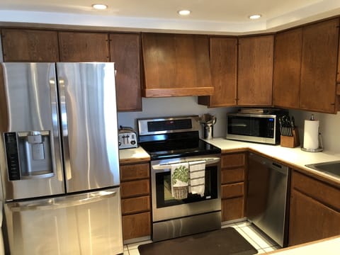 Fully stocked Kitchen with all Stainless steel appliances. 