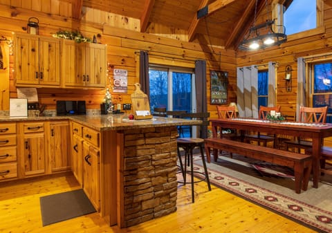 The Lodge open concept allows seating for 8-10 at the table and 4 bar stools too!