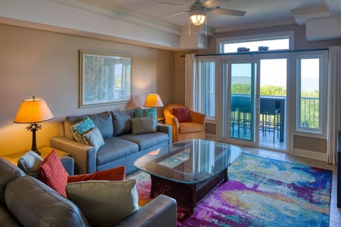 Comfortable living room open to balcony 