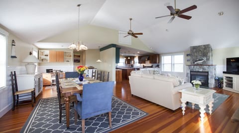 Top floor living, dining, kitchen, desk and hall to 1/2 bath.