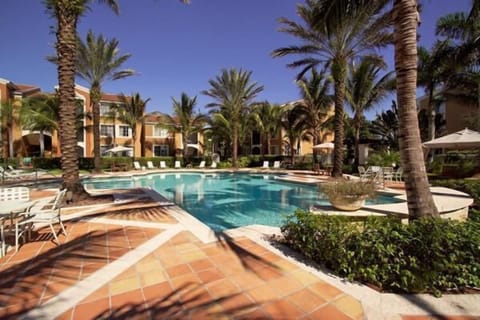 Pool with condos in background