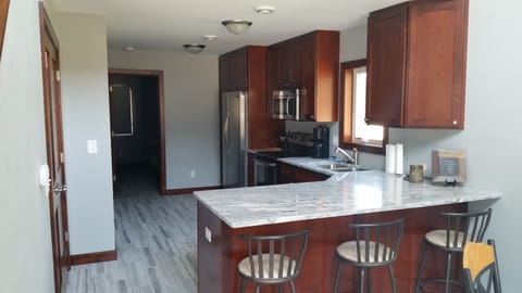 Kitchen showing the knotty alder wood work