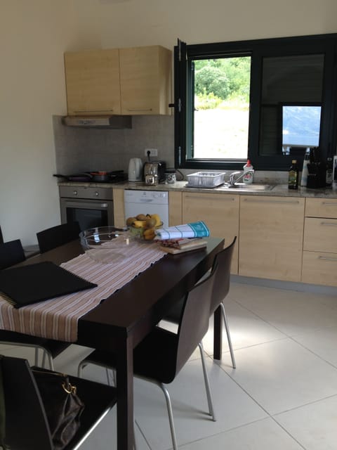 kitchen with dining space, open plan to living room