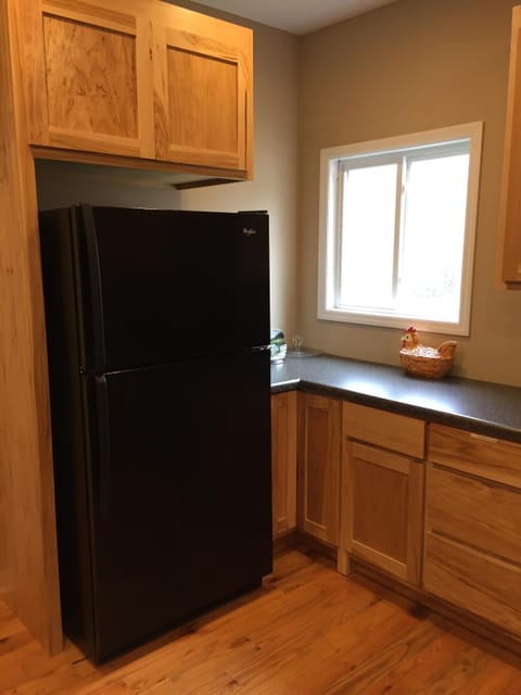 Spacious refrigerator with ice maker