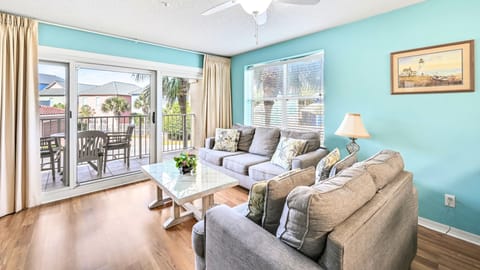 Comfortable seating in a sunlit living space.
