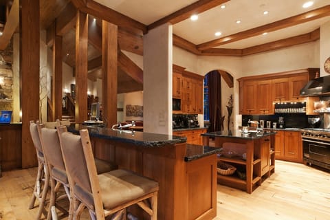 Bar Stool seating for 7 with kitchen table seating an additional 5